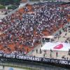 A torcida do Corinthians levou faixas e bandeiras homenageando as vítimas do Japão