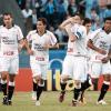 Jogadores do Corinthians comemorando o gol de empate